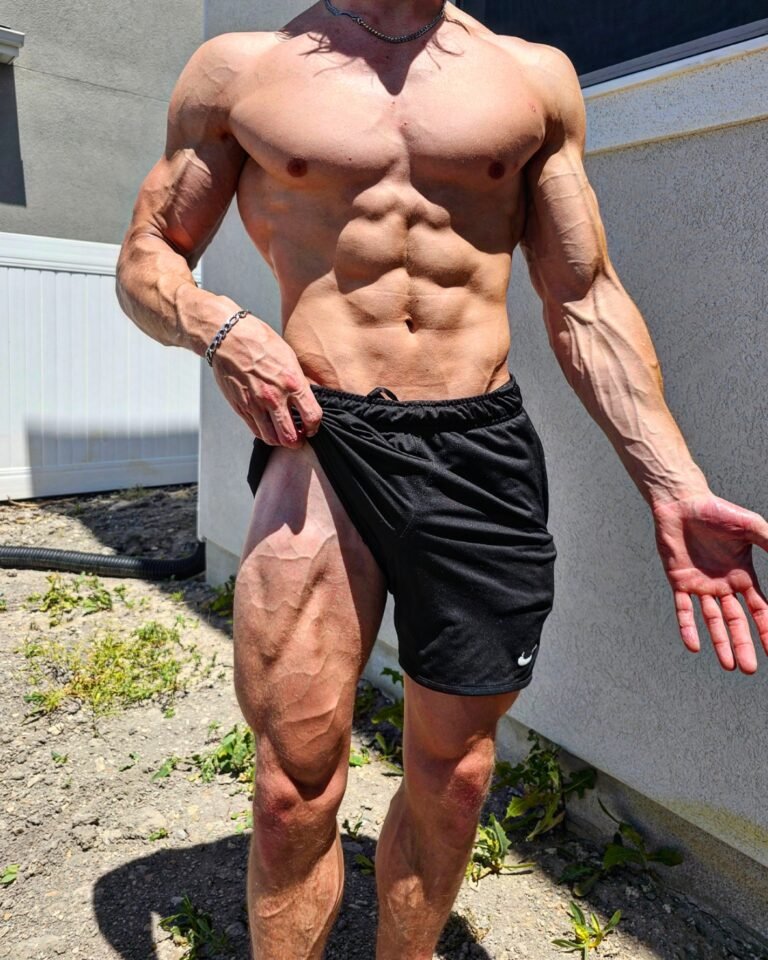 bodybuilder flexing veins